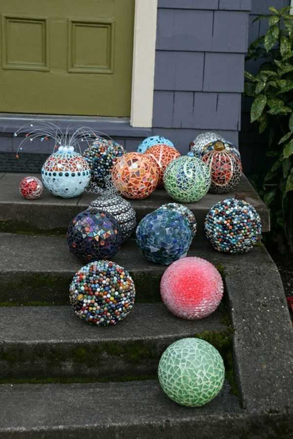 Как правильно сделать клумбу из декоративных камней для цветов на улице, как украсить
 - 31 фото