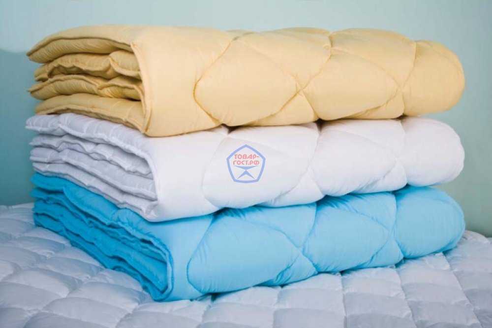 Как стирать одеяло: ватное, шерстяное и с другими наполнителями