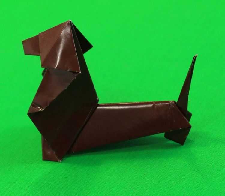 Оригами собака: подробная схема складывания. пошаговая инструкция, как сделать простую собаку, собаку-кусаку, модульную собаку. 70 фото-схем для сборки собак оригами разных пород из бумажных модулей